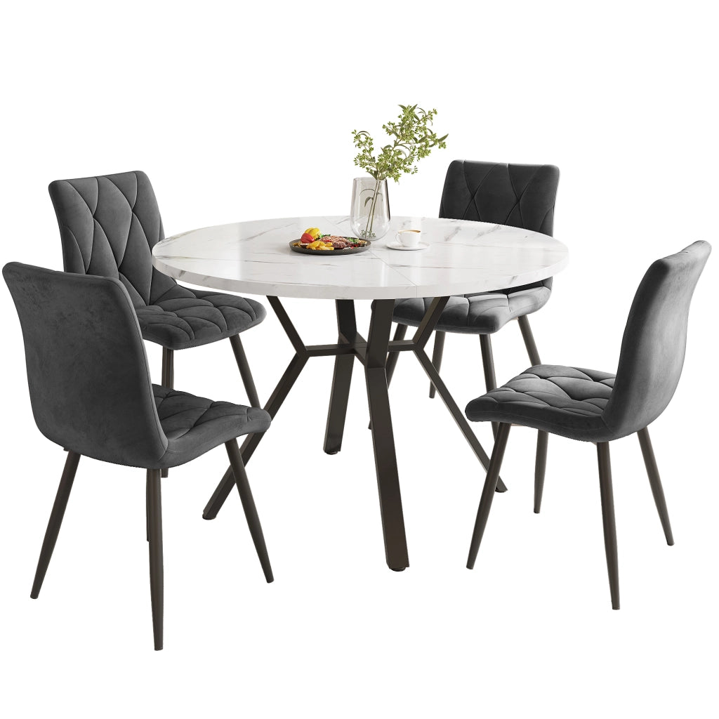 Tavolo da pranzo per 4 persone con piano rotondo effetto marmo, gambe in metallo nero e 4 sedie ergonomiche