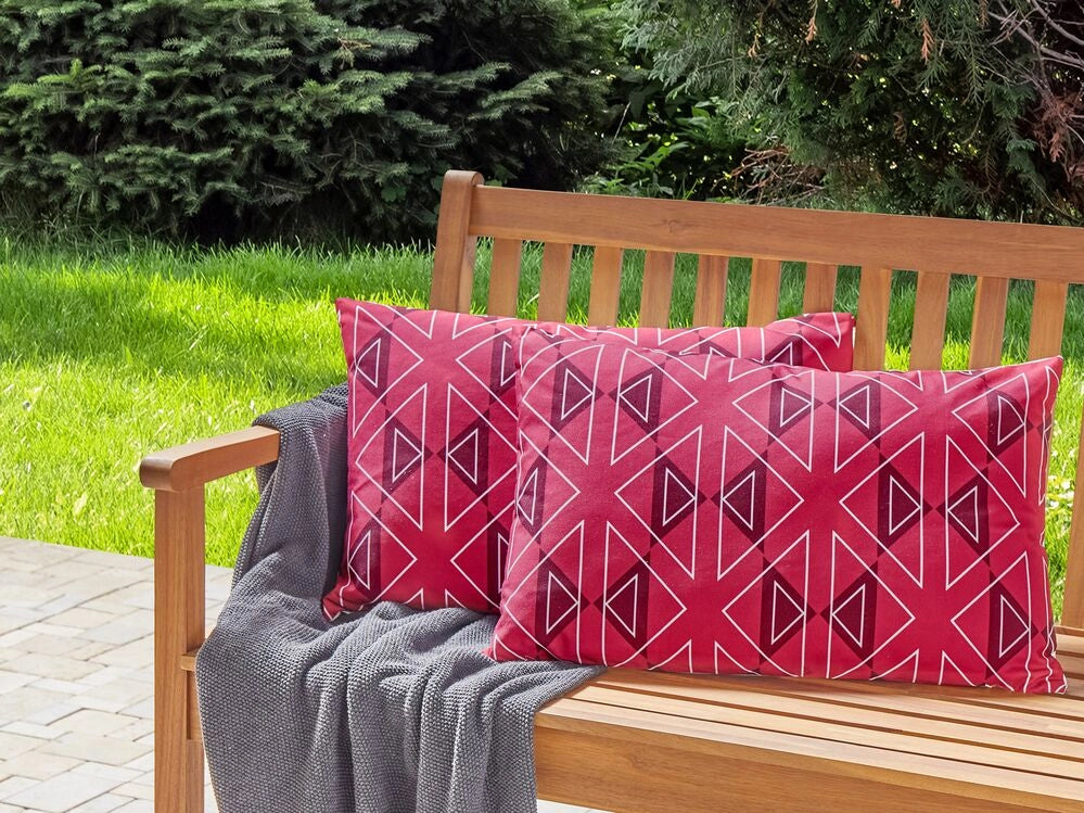 Set di 2 cuscini da giardino in poliestere fucsia con motivo geometrico 40 x 60 cm rettangolari moderni per esterni resistenti all'acqua.