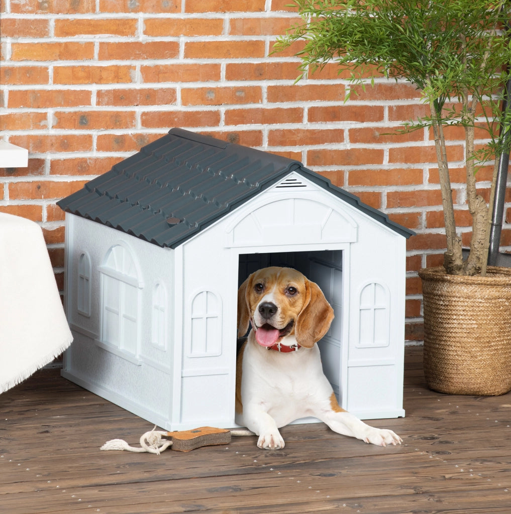 Cuccia per cani in plastica grigia con tetto inclinato