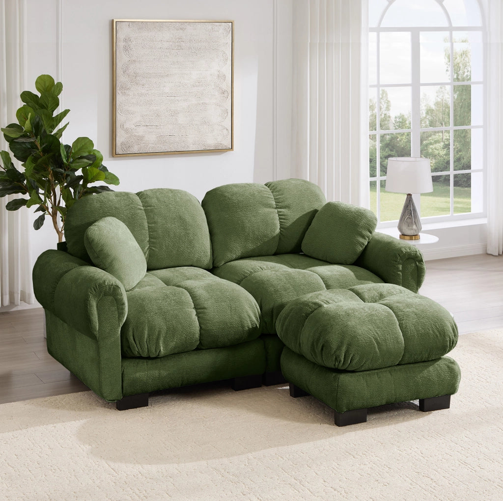 Divano in ciniglia con ottomana mobile; configurazione a L; 190x149x90 cm; verde
