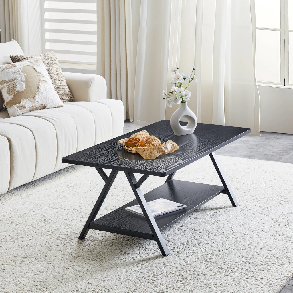 Tavolino basso con ripiano portaoggetti, effetto legno nero e struttura in metallo, per soggiorno, 110 × 57 × 44,5 cm