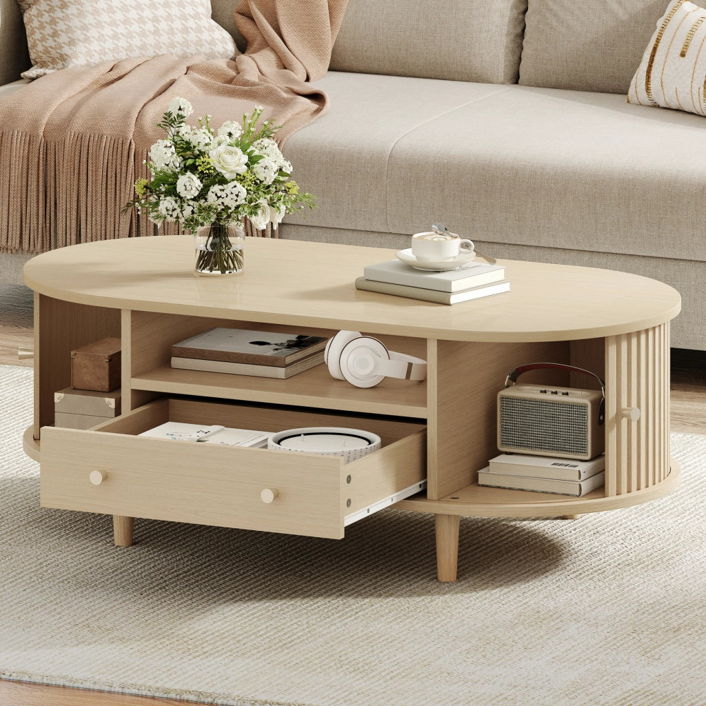 Tavolino basso ovale con 1 cassetto, vani aperti e anta scorrevole, per soggiorno, in MDF, rovere, 100 × 50 × 36 cm