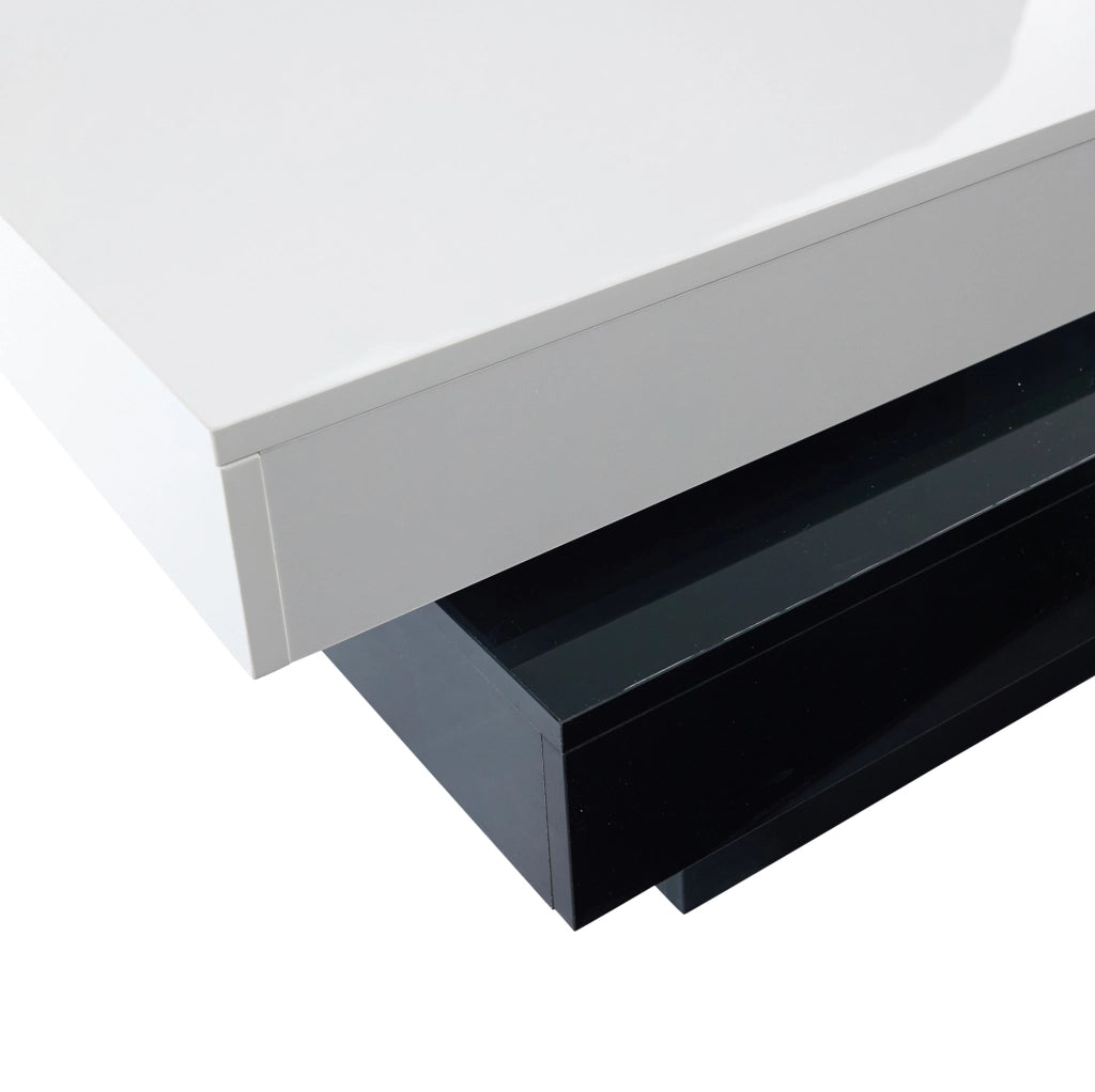 Tavolino da salotto 103x60x35.5 cm girevole a due livelli in truciolare bianco e nero