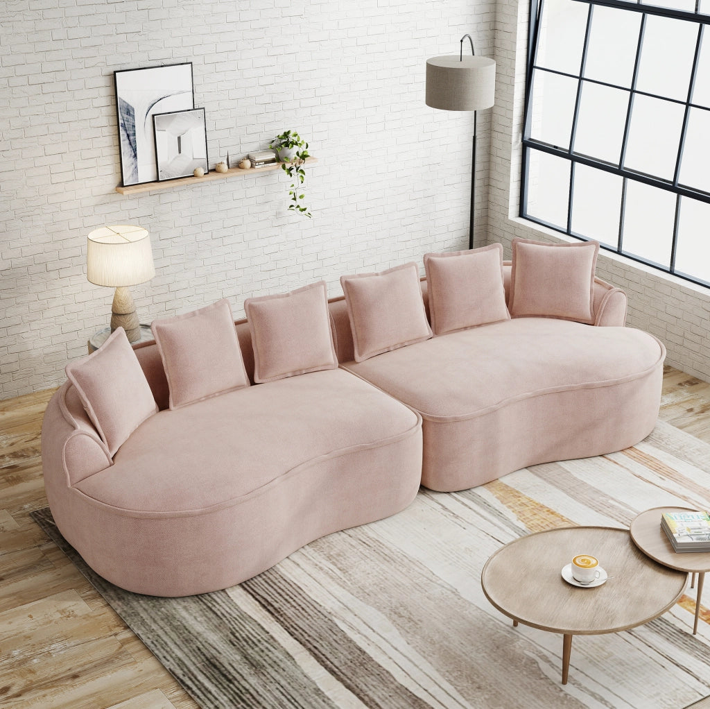 Divano modulare senza struttura in tessuto chenille rosa; con chaise longue profonda e cuscini