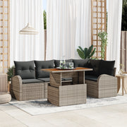Set da Pranzo da Giardino di 6 Pezzi con Cuscini Grigio in Polyrattan e Acacia