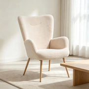 Poltrona moderna con schienale alto e braccioli integrati, poltrona lounge dalla silhouette curva, poltrona singola, per soggiorno, camera da letto o