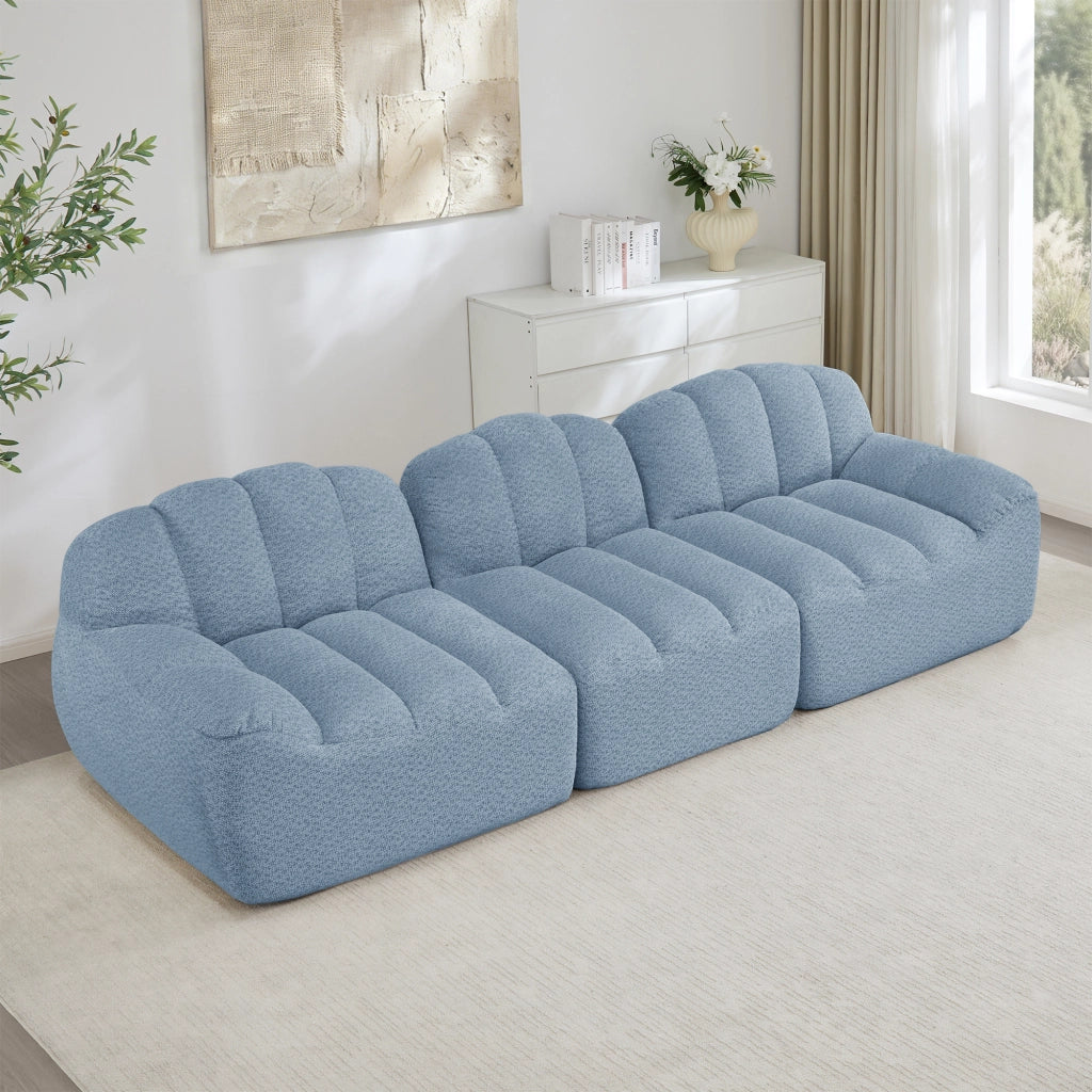 Divano modulare con seduta profonda e forma ergonomica in pile granulato blu