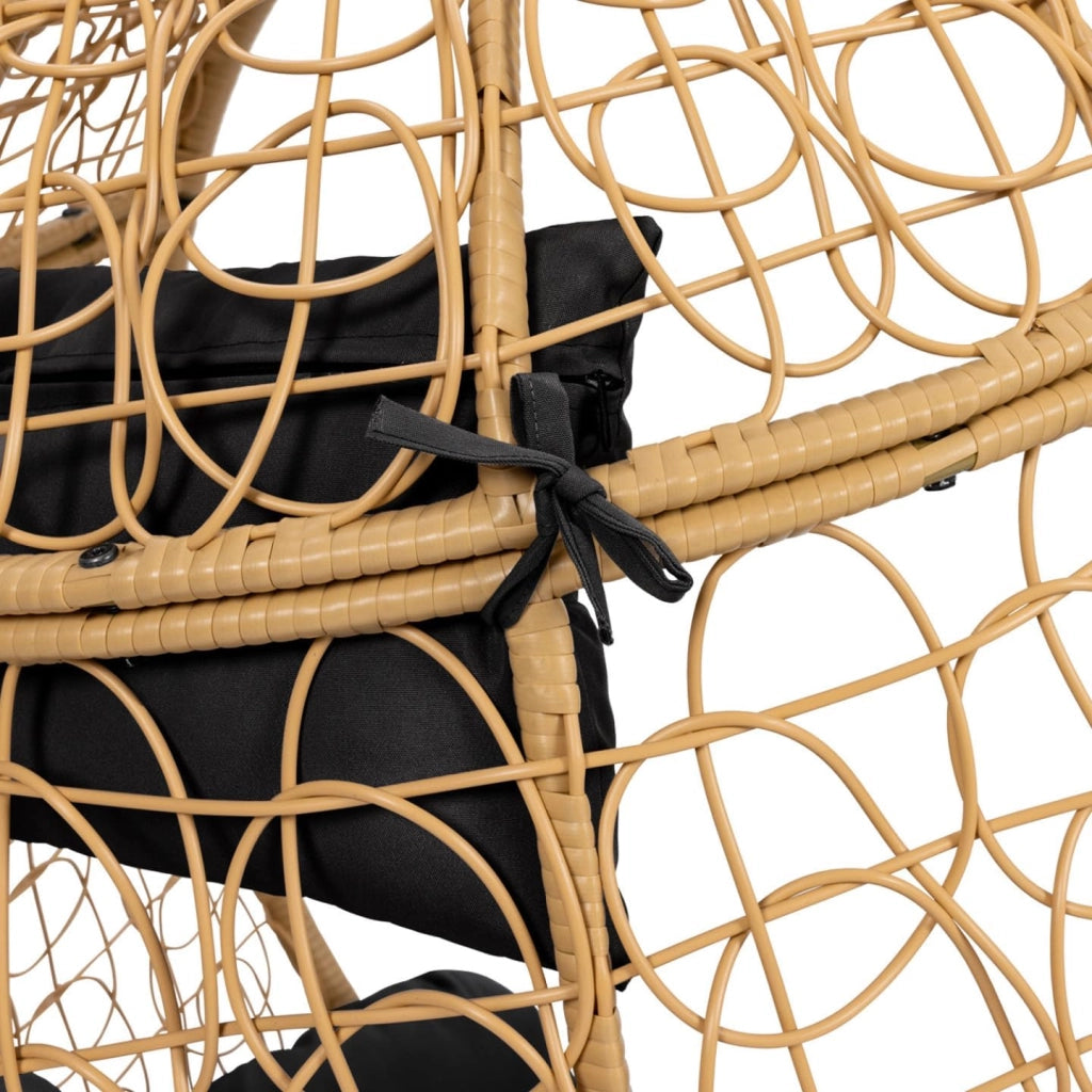 Poltrona sospesa a Forma di Uovo in Rattan Traforato con Cuscino Nero