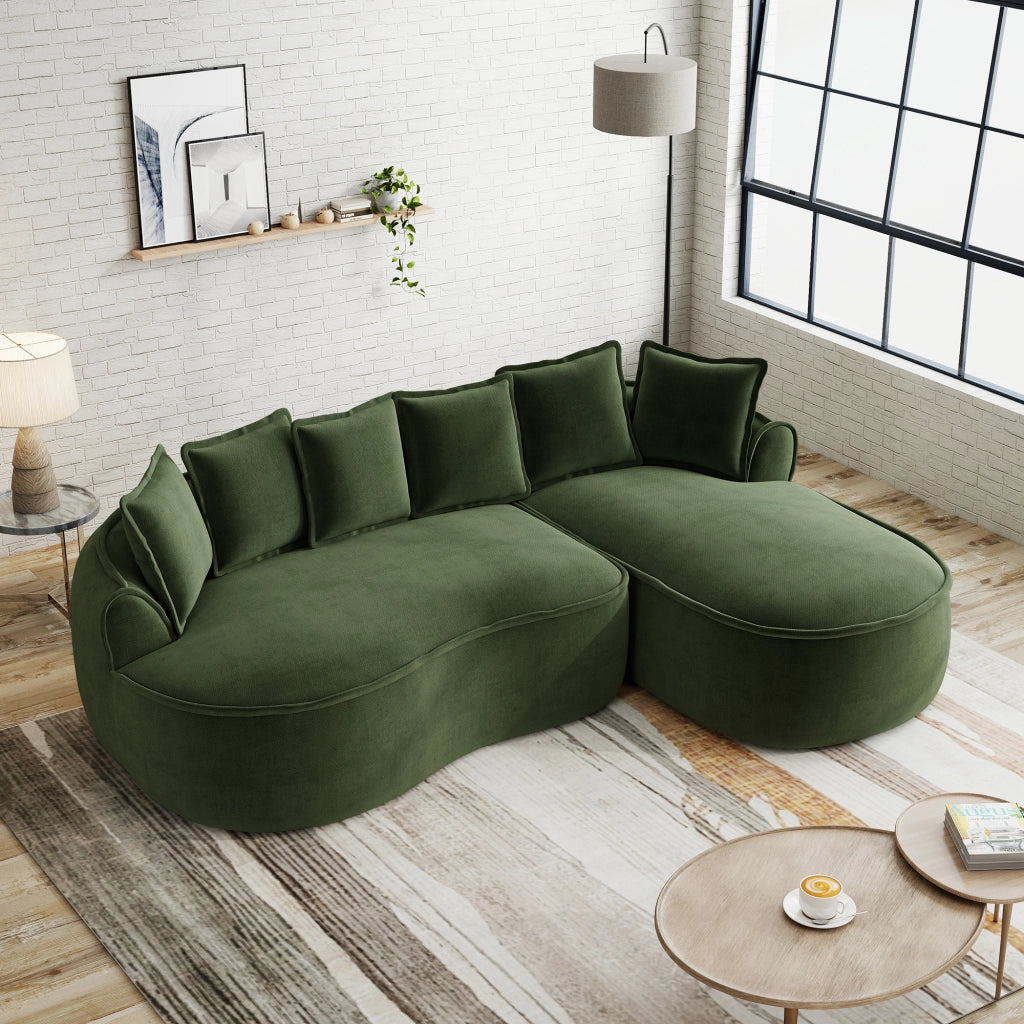 Divano modulare angolare senza struttura; chaise longue profonda con ampi braccioli; chenille verde