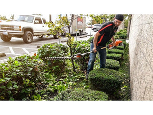 Tagliasiepi a batteria Husqvarna 120i TK4-H con asta telescopica + BLi10 e QC80