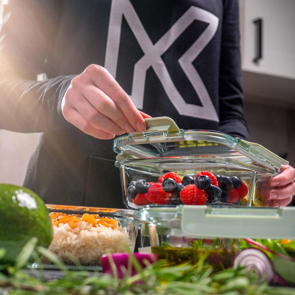 Set di 4 contenitori per alimenti in vetro KADAX da 1 litro con divisori, ideali per il pranzo.
