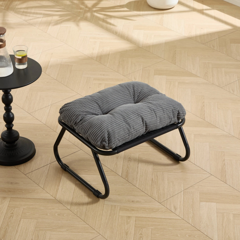 Poltrona lounge da esterno con pouf in acciaio; cuscino grigio