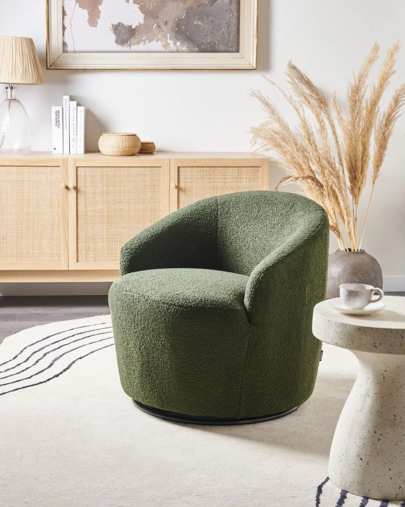 Poltrona con schienale curvo in tessuto bouclé verde base girevole 360° Art Deco dorato