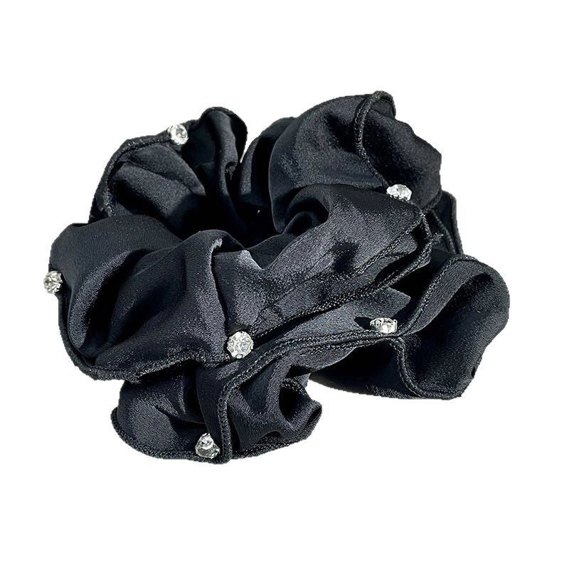 Elastico nero per coda di cavallo, accessorio per capelli elegante e semplice per le donne.