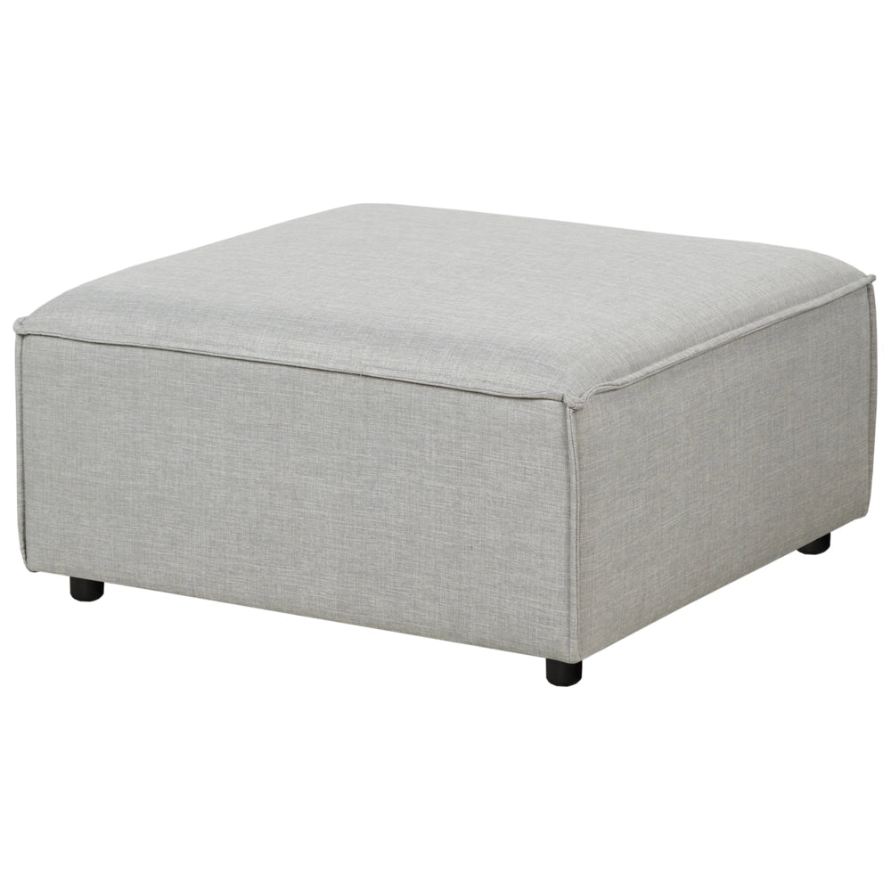 Ottomana imbottita in tessuto beige di forma quadrata con gambe nere stile moderno