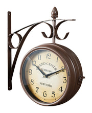 Biscottini Orologio bifacciale da parete tipo stazione in ferro battuto finitura marrone scuro anticato L33XPR10xH36 cm