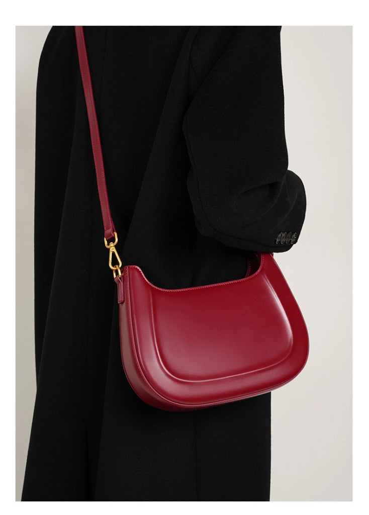 Borsa a tracolla da donna in vera pelle, modello Crescent, alla moda, colore rosso.
