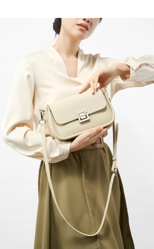 Borsa a tracolla da donna TOGO in vera pelle, colore bianco.