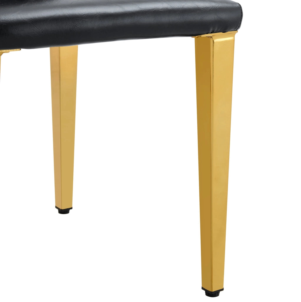 Set di 4 sedie da pranzo nere e oro in PU e metallo
