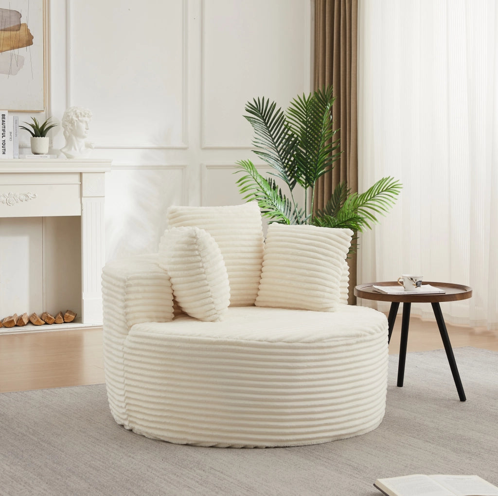 Poltrona relax rotonda in velluto a coste beige con tre cuscini
