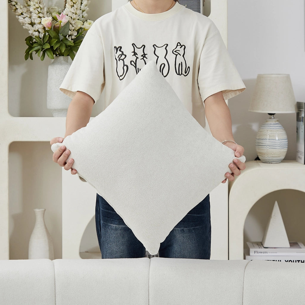 Divano modulare curvo in chenille beige con 2 cuscini, design ispirato ai tasti del pianoforte