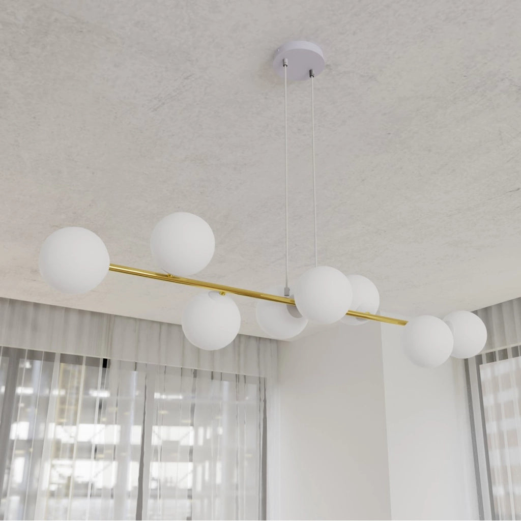 Lampada a sospensione Gravity con diffusori in vetro e dettagli oro
