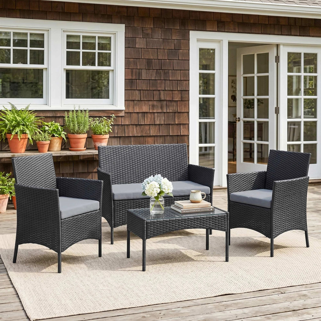 Set da giardino 4 posti in polyrattan con divani e tavolino in vetro ¨C zephmum ¨C grigio