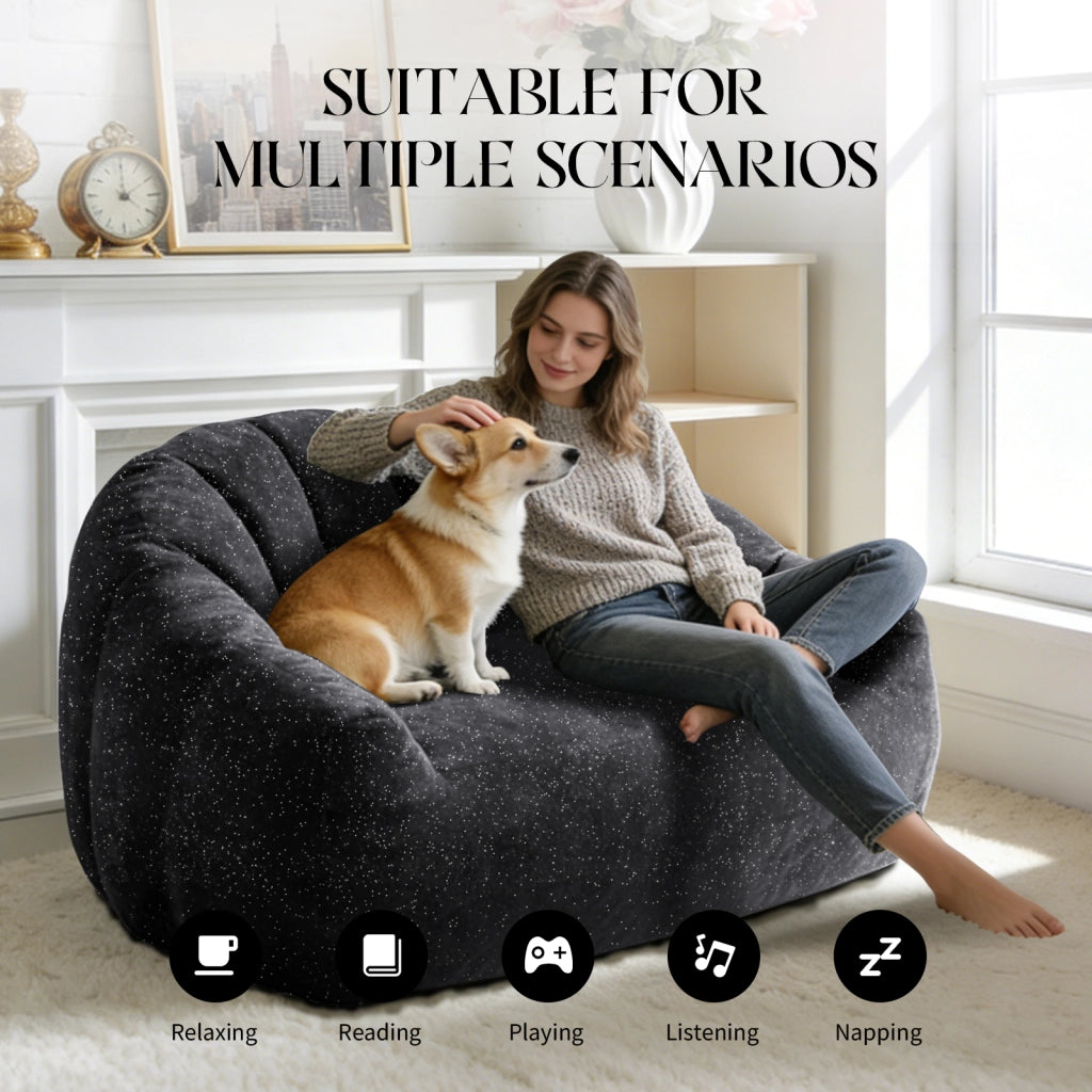 Fauteuil pouf con design a zampa d'orso e seduta ampia in flanella nera per soggiorno, camera da letto e zona relax