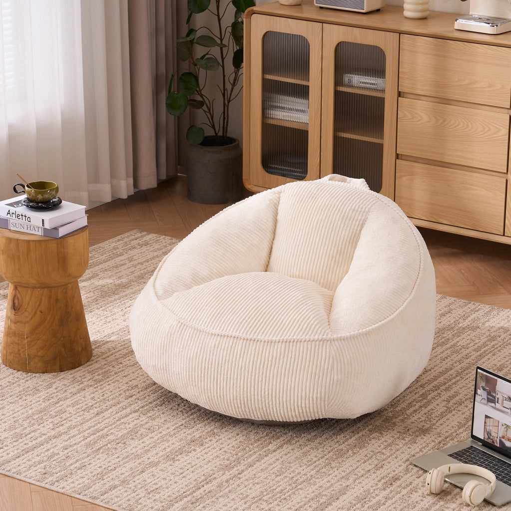 Poltrona sacco in velluto a coste beige con schienale ergonomico e imbottitura in memory foam