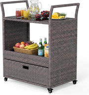 Carrello Bar in Rattan PE, Tavolo Bar da Esterno con Ruote, Ripiano Aperto, Cassetto e Piano in Vetro Temperato, Carrello di Servizio con Maniglie per Giardino, Cortile, Piscina, 85 X 47 X 92 CM