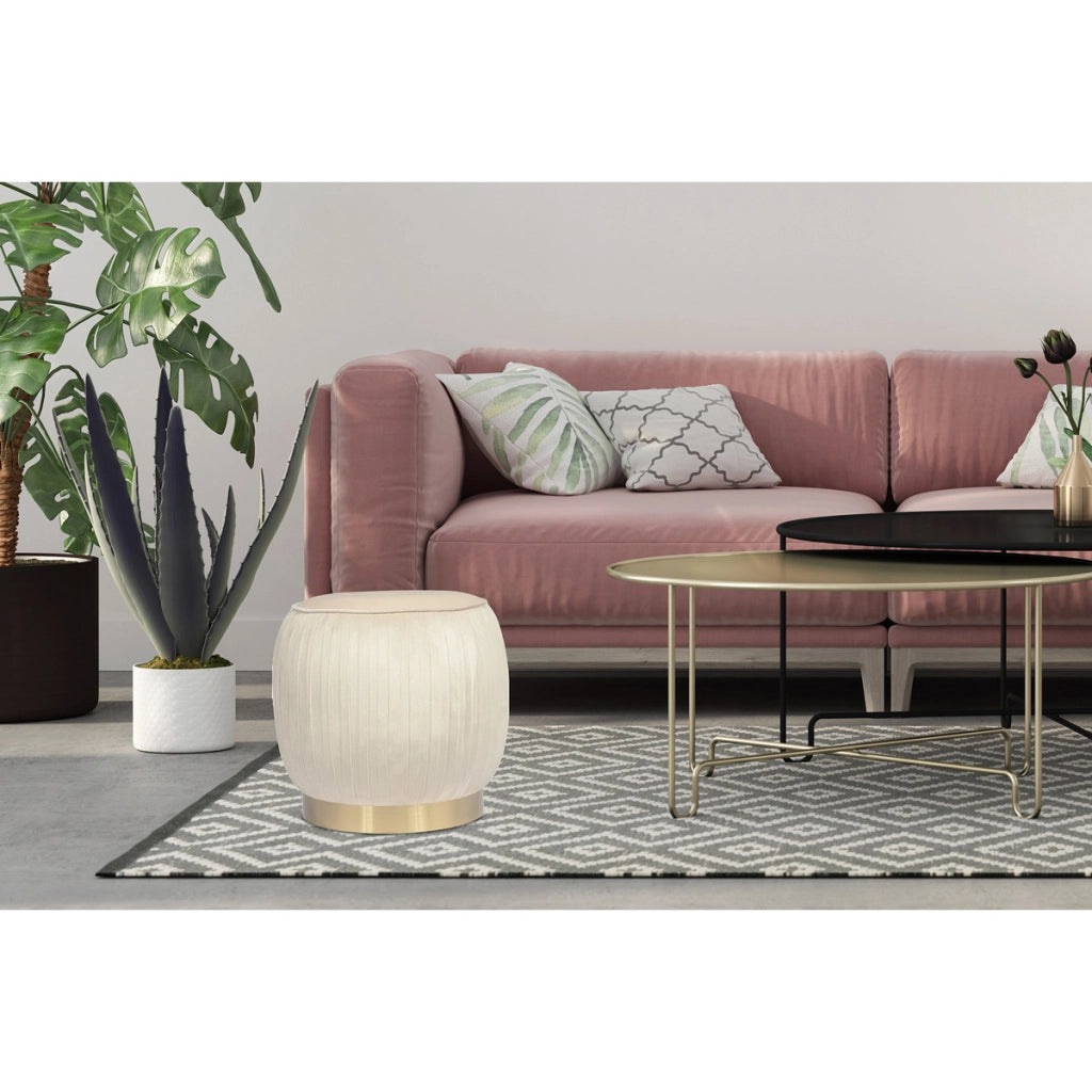 Pouf in velluto Lyla crema con base dorata