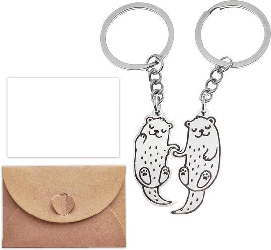 1 coppia di carillon di animali in metallo con cartoni di lontra per amici e coppie accessori per chiavi e tasche a più colori