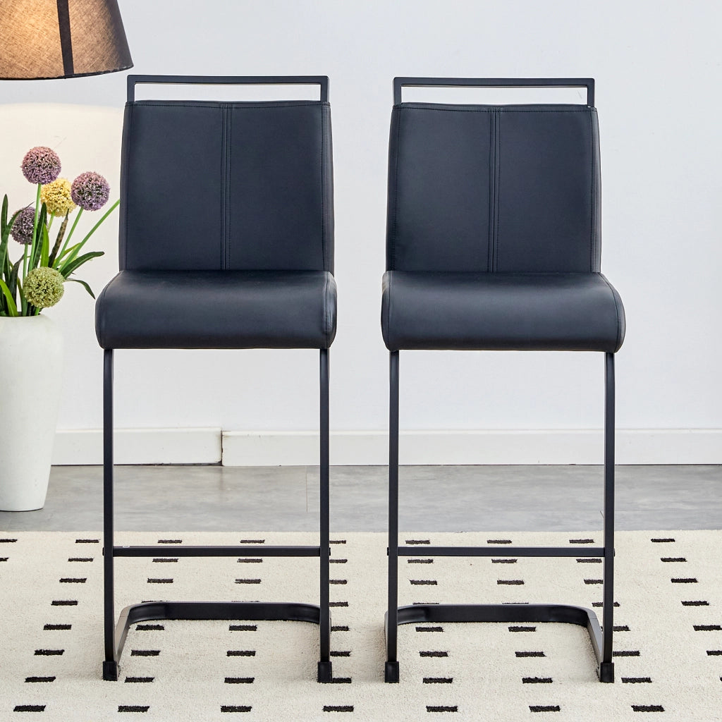 Coppia di sgabelli da bar con schienale e poggiapiedi, design moderno, in similpelle e metallo nero