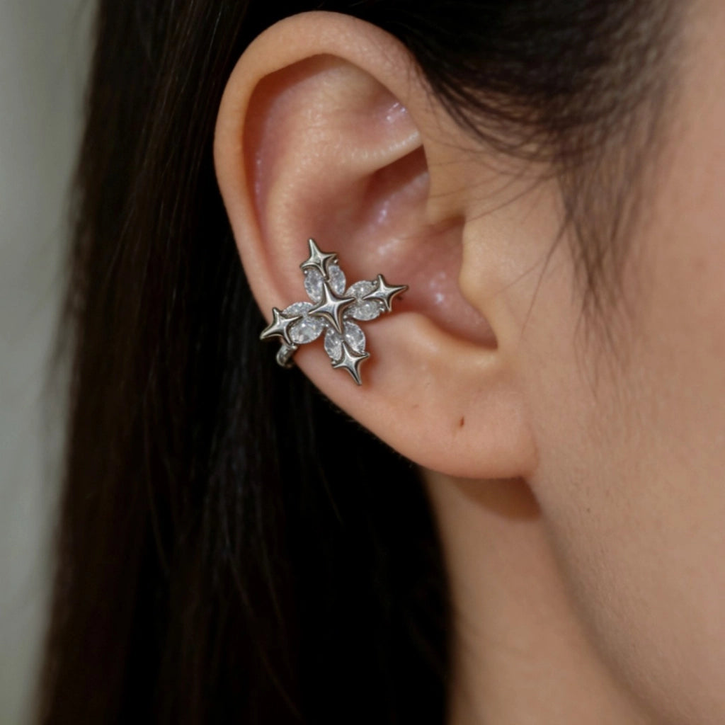 Orecchini a clip con croce a forma di fiore e stella in zirconi, adatti anche a orecchie non forate.