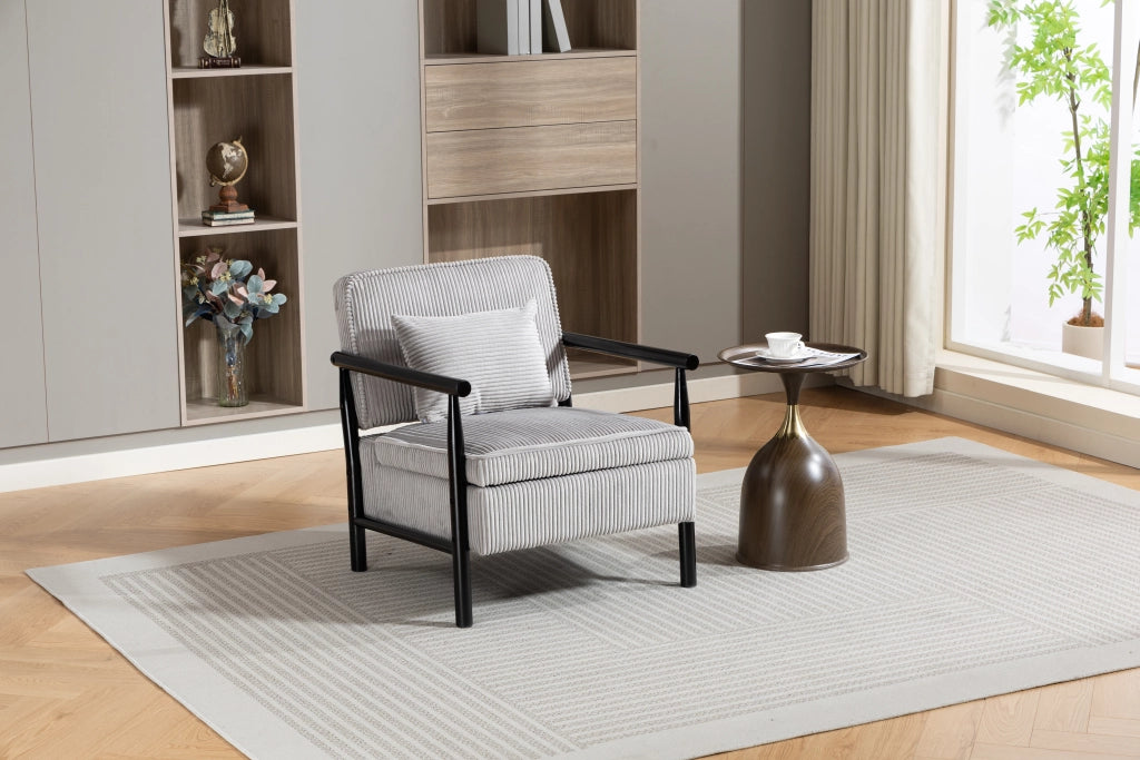 Poltrona contenitore in velluto grigio chiaro con struttura in legno e cuscino lombare