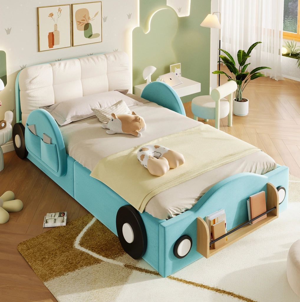 Letto imbottito 90x200 cm con contenitore idraulico; tasche laterali e cuscino grande in flanella blu
