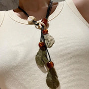 Collana vintage con ciondolo a foglia e perline: gioielli con nappe fatti a mano