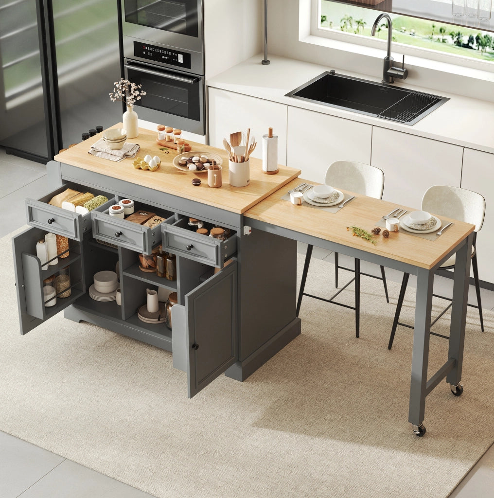 Isola da cucina con ruote grigia con piano estensibile e vani contenitori