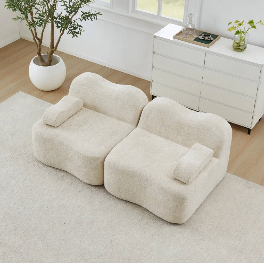 Divano modulare senza struttura interna in velluto beige con pouf collegabile