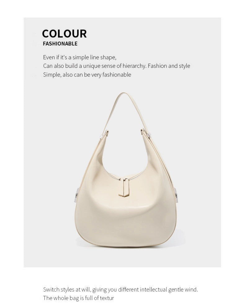 Borsa a tracolla da donna in vera pelle con tracolla larga, colore bianco.