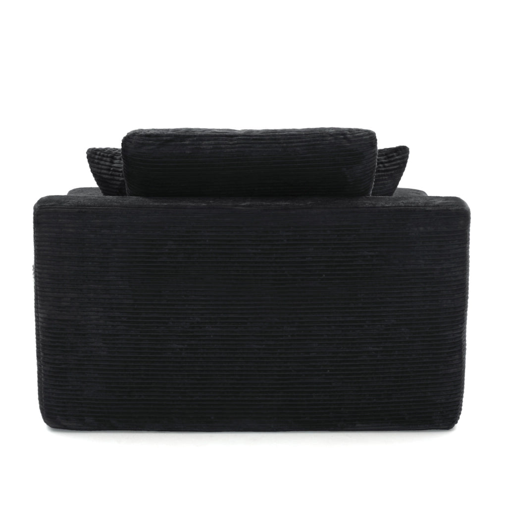 Divano compatto in corduroy nero con tasche laterali e cuscini; stile retr貌