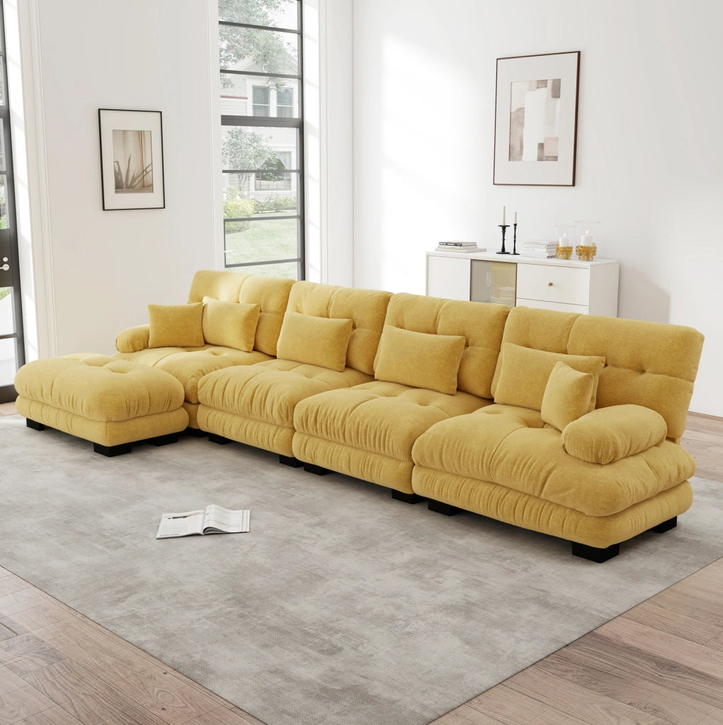 Divano modulare angolare in ciniglia gialla con pouf mobili