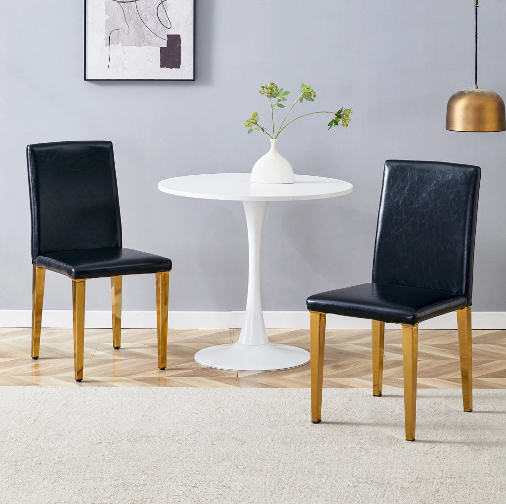Set di 2 sedie da pranzo nere e oro in PU e metallo