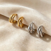 Lussuosi orecchini metallici in oro e argento