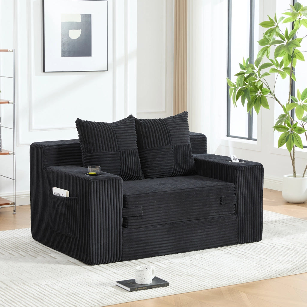 Pouf divano in velluto a coste nero 151x133x64 cm con tasche laterali e 2 cuscini