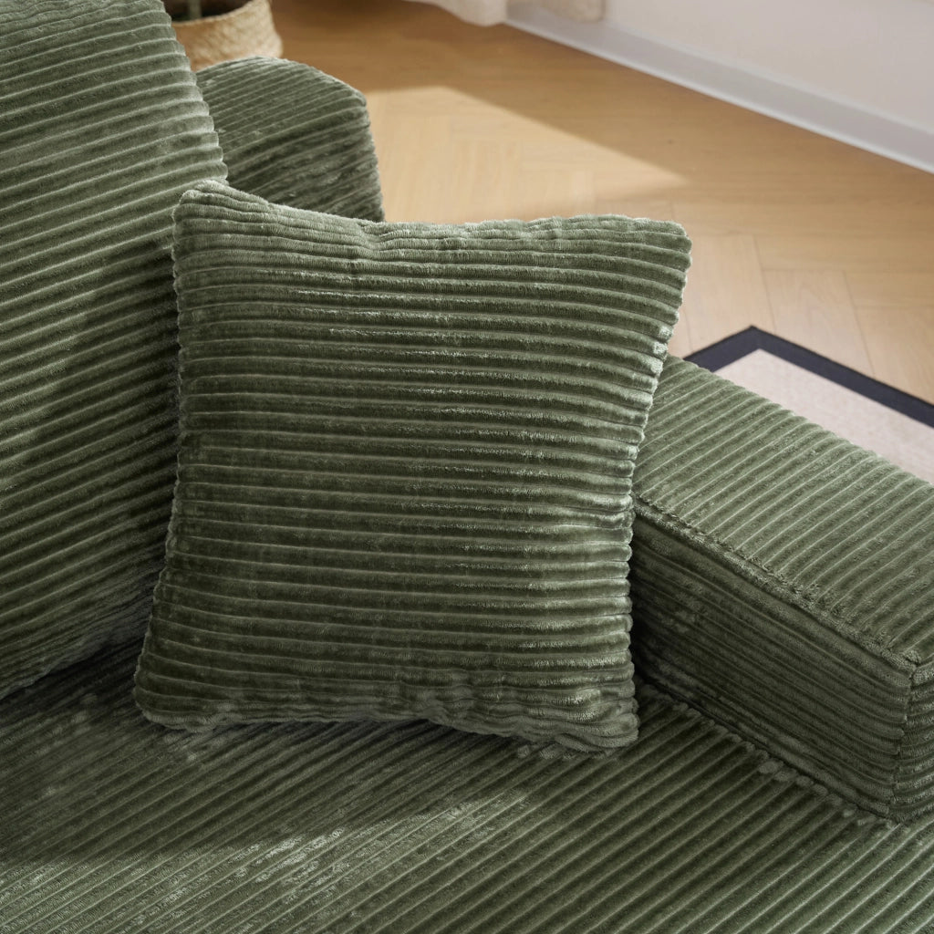 DIVANO in velluto a coste verde con tasche laterali e cuscini