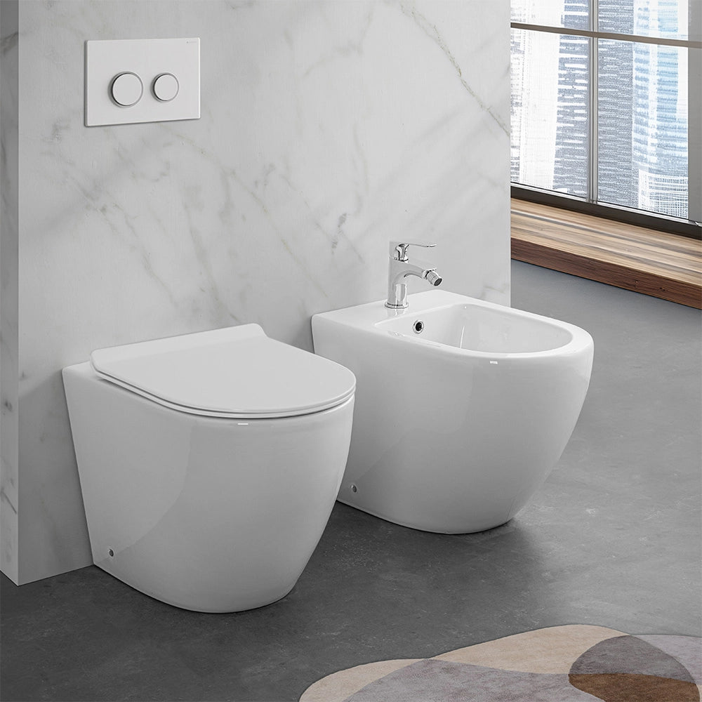 Wc per anziani filomuro H 50 cm con scarico traslato serie Comoda