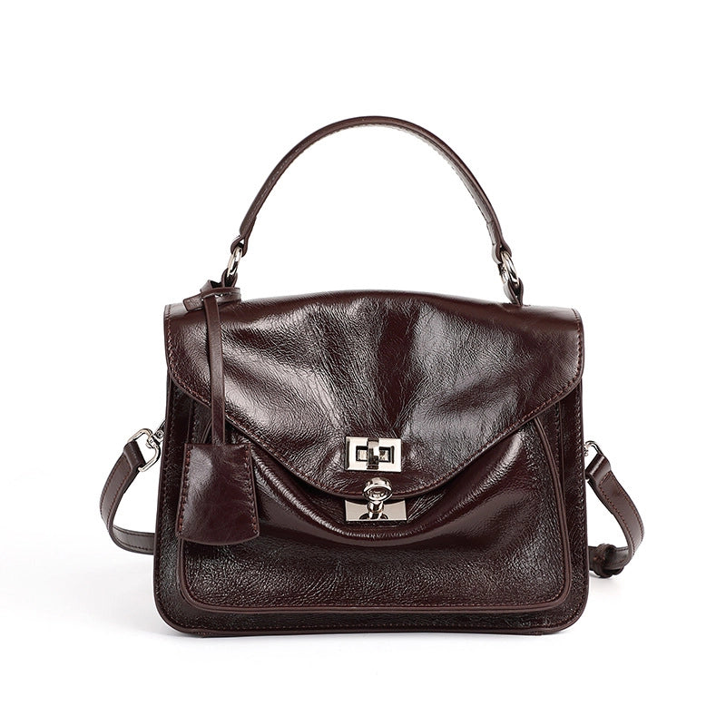 Borsa a tracolla da donna in vera pelle, modello tote/hobo, colore marrone.