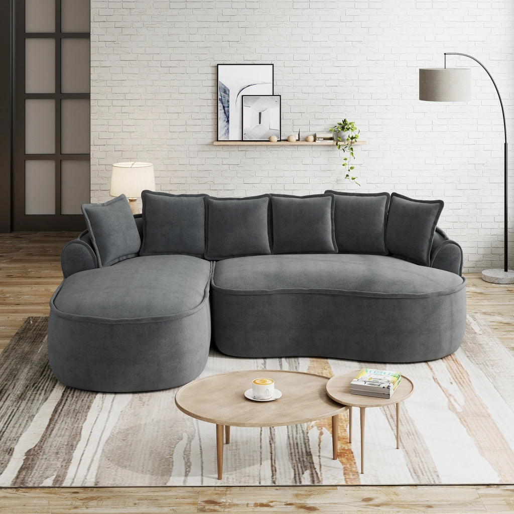 Divano modulare convertibile con chaise longue; seduta profonda; braccioli larghi; cuscini; ciniglia grigio