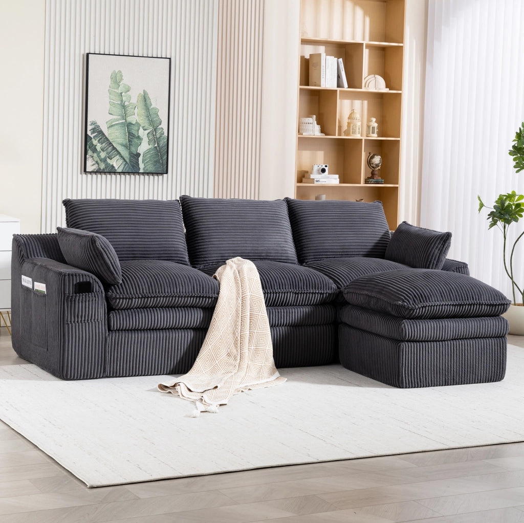 Divano modulare ULEVR 263x167x85 cm con pouf, tasche laterali e cuscini, velluto a coste grigio scuro